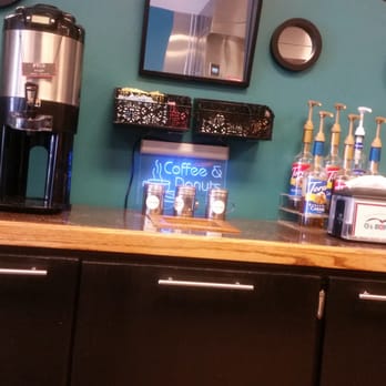 O's Donuts - DIY coffee station with all the necessities plus 6 different flavored syrups. - Donuts Near Me - Norfolk, Virginia