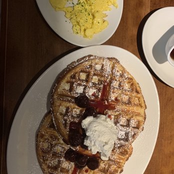Stoney River - Waffles with black cherry sauce, scrambled egged and OJ - Steakhouses Near Me - Louisville, Kentucky Stoney River - Waffles with black cherry sauce, scrambled egged and OJ - Steakhouses Near Me - Louisville, Kentucky