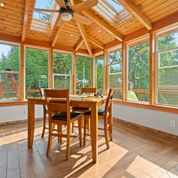 BB-Builders Pro - A stunning kitchen remodeling project that combines modern finishes with natural warmth, showcasing wood ceilings, custom cabinetry, stainle - General Contractors Near Me - Renton, Washington