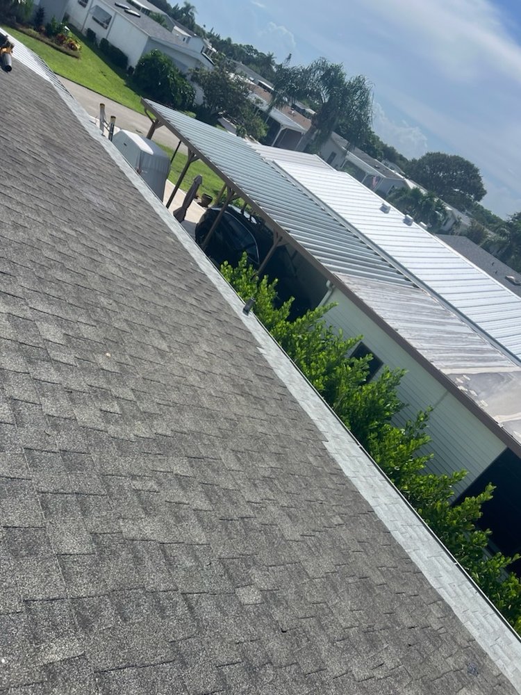 Slide of Adrian Roofing