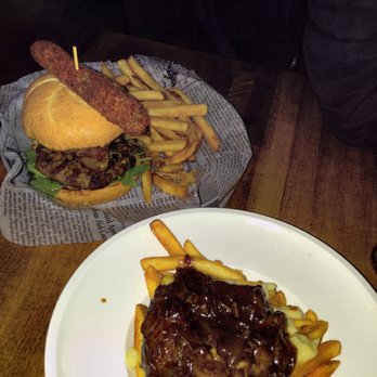 The Brickworks - $22 burger with beef, pork belly, and sausage. Short rib poutine - Cocktail Bars Near Me - Whistler, British Columbia The Brickworks - $22 burger with beef, pork belly, and sausage. Short rib poutine - Cocktail Bars Near Me - Whistler, British Columbia