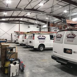 Shop and vans ready to go to work.