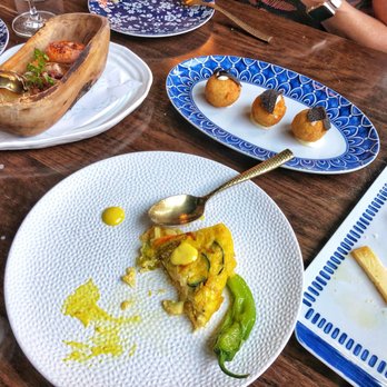 Del Mar - Top left: octopus, top right: truffle jamon croquettes, center: tortilla de espanol - Spanish Near Me - Washington, DC, District of Columbia