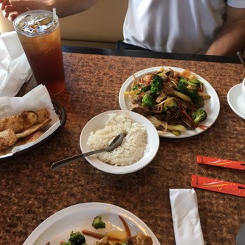 Warrior's Grill - Our food and soup, and the table was set with rice and bread when we sat down after getting our meals. - Mongolian Near Me - Virginia Beach, Virginia