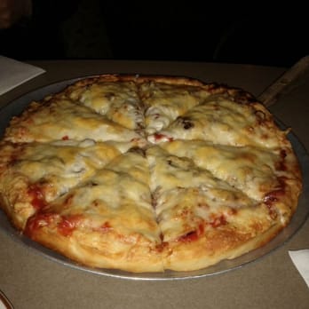 Starlite Restaurant & Bar - a cheese pizza - Canadian (New) Near Me - Calgary, Alberta Starlite Restaurant & Bar - a cheese pizza - Canadian (New) Near Me - Calgary, Alberta