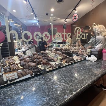 The Chocolate Bar - a woman holding a plate of food - Chocolatiers & Shops Near Me - Westfield, New Jersey The Chocolate Bar - a woman holding a plate of food - Chocolatiers & Shops Near Me - Westfield, New Jersey