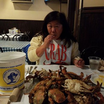 Quarterdeck - Lady D cracks her first crab - Seafood Near Me - Arlington, Virginia