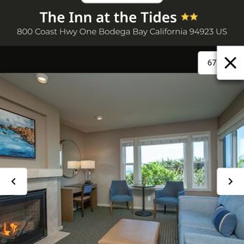 The Inn at the Tides - Was one of their more expensive rooms king size bed seating area, couch, fireplace outdoor patio - Hotels Near Me - Bodega Bay, California