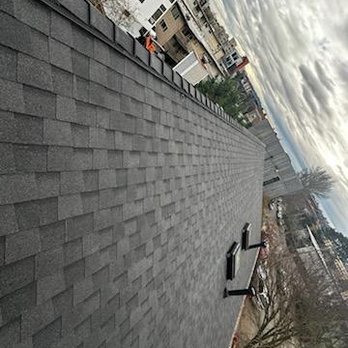 Rainier Roofing Company - New shingles and ridge vent installed. - Roofing Near Me - Seattle, Washington Rainier Roofing Company - New shingles and ridge vent installed. - Roofing Near Me - Seattle, Washington