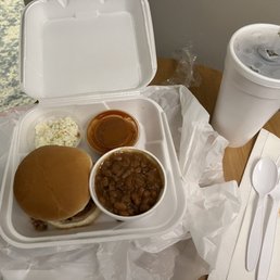 Brisket sandwich, coleslaw baked beans, bbq sauce, and sweet tea. Brisket sandwich, coleslaw baked beans, bbq sauce, and sweet tea.