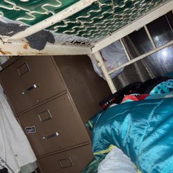 The view from my bunk. the other bunk pictured is on the other side of the file cabinet, blocking the only window that could open in a fire
