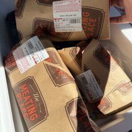 Putting the meat in our cooler.