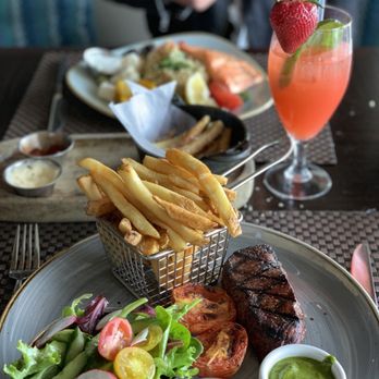 Six Seven Restaurant - Sirloin steak with fries - New American Near Me - Seattle, Washington Six Seven Restaurant - Sirloin steak with fries - New American Near Me - Seattle, Washington