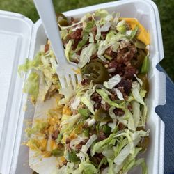 Freda's Food Truck Trailer - New Chicken rancher-o nachos. Hefty portion for $12. Here at the Levitt Pavilion in Dayton. Voted beat in Dayton!