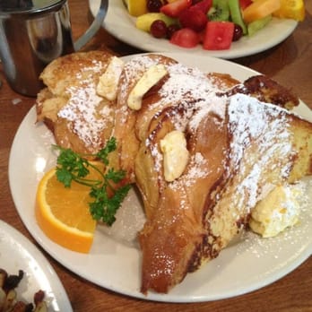 Tre Kronor - Vanilla orange French toast with broccoli cheddar quiche (yum) in the background. - Breakfast & Brunch Near Me - Chicago, Illinois Tre Kronor - Vanilla orange French toast with broccoli cheddar quiche (yum) in the background. - Breakfast & Brunch Near Me - Chicago, Illinois