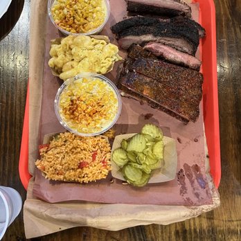 Terry Black's Barbecue - Brisket, pork ribs, creamed corn, pickles, Mac n cheese and mexican rice - Barbeque Near Me - Austin, Texas Terry Black's Barbecue - Brisket, pork ribs, creamed corn, pickles, Mac n cheese and mexican rice - Barbeque Near Me - Austin, Texas