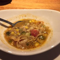 The tiniest bowl of soup ever poured. There might be 5-6 spoonfuls in this bowl. I've not eaten any.