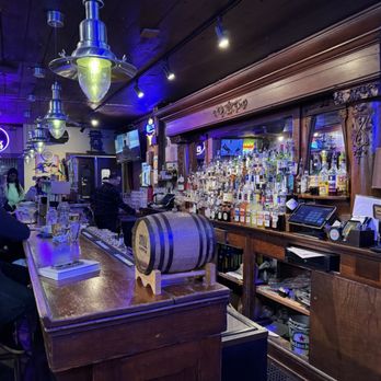 Cedar Door Patio Bar & Grill - The bar when you walk in the door. - American Near Me - Austin, Texas Cedar Door Patio Bar & Grill - The bar when you walk in the door. - American Near Me - Austin, Texas