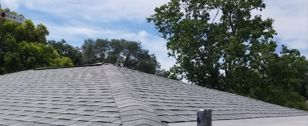 Slide of Husar Roofing