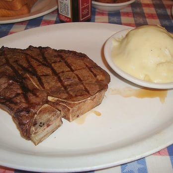 T-Bone Tom's - 14-ounce T-Bone Steak and Mashed Potatoes - Barbeque Near Me - Kemah, Texas T-Bone Tom's - 14-ounce T-Bone Steak and Mashed Potatoes - Barbeque Near Me - Kemah, Texas