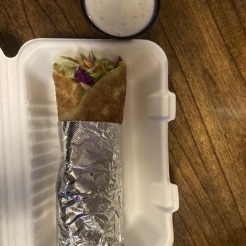 The Roll Pod Indian Restaurant - Aloo gobhi matar roll pod with a side of raita sauce - Indian Near Me - Seattle, Washington