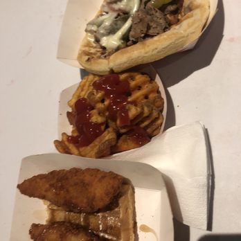 Waffle O'licious - Chicken and waffle, waffle fries (I added the ketchup) and a Philly Cheesesteak. - Food Trucks Near Me