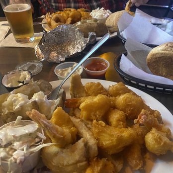 Uncle Ray's Place - Seafood Platter with baked potato and coleslaw - Bars Near Me - Dearborn Heights, Michigan