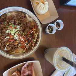 Pork Noodles, Curry Bun, Jasmine Milk Tea, Shrimp Potstickers