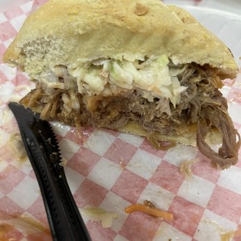 Delauders BBQ - Pulled Pork Topped with Slaw - Barbeque Near Me - Sevierville, Tennessee Delauders BBQ - Pulled Pork Topped with Slaw - Barbeque Near Me - Sevierville, Tennessee