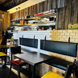 Reposados Tacos y Tequila - Inside seating tables and benches