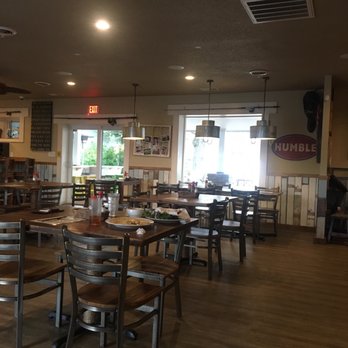 The Trading Post - They have a nice outside area with a fire pit and a bar . Dog walking area and a poop station. - Southern Near Me - Emerald Isle, North Carolina