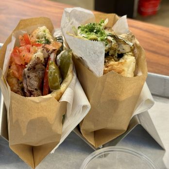 Miznon - Rotisserie Broken Chicken on the right and Rib Eye Minute Steak on the left - Venues & Event Spaces Near Me - Los Angeles, California Miznon - Rotisserie Broken Chicken on the right and Rib Eye Minute Steak on the left - Venues & Event Spaces Near Me - Los Angeles, California
