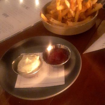 The Henry - Truffle Fries. Parm on fries. Truffle aioli and ketchup. I heart truffle. - New American Near Me - Phoenix, Arizona