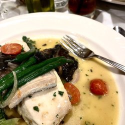 Sam's Italian Restaurant - Look Past The Liquid. The Halibut Was Super Meaty. Portobello's+Veggies Were A Nice Side & The Sauce Was Garlicky Good.