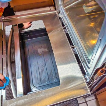 West Texas Property Solutions - a man in a surgical mask opening an oven door - Home Cleaning Near Me - El Paso, Texas West Texas Property Solutions - a man in a surgical mask opening an oven door - Home Cleaning Near Me - El Paso, Texas