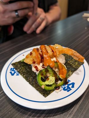 Kura Revolving Sushi Bar by null