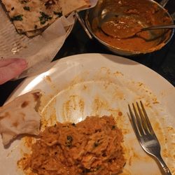 Indian Mix Grill & Bar - The last of my chicken Tikka Masala and garlic naan.