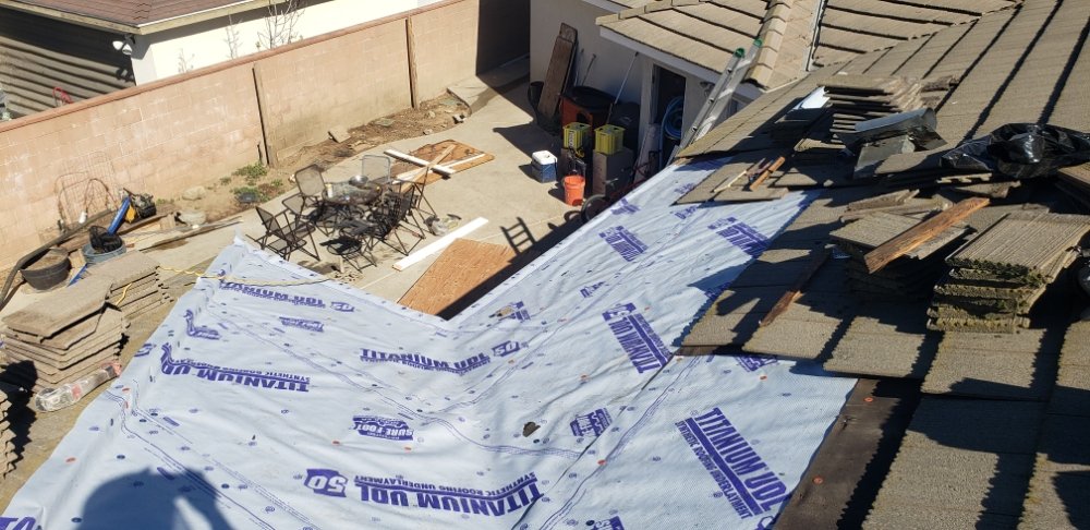 Slide of J 1 Pro Roofing