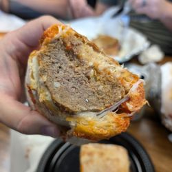 A beatiful meatball parm sandwich