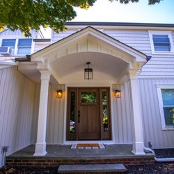 Majestic Exteriors - Front Portico Construction, Bluestone Platform, Siding, and Front Door, all completed by Majestic