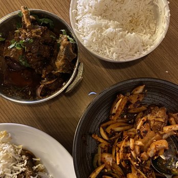 Peak Restaurant and Bar - Pork belly and the anhuma goat w/ rice - Sports Bars Near Me - Irving, Texas Peak Restaurant and Bar - Pork belly and the anhuma goat w/ rice - Sports Bars Near Me - Irving, Texas
