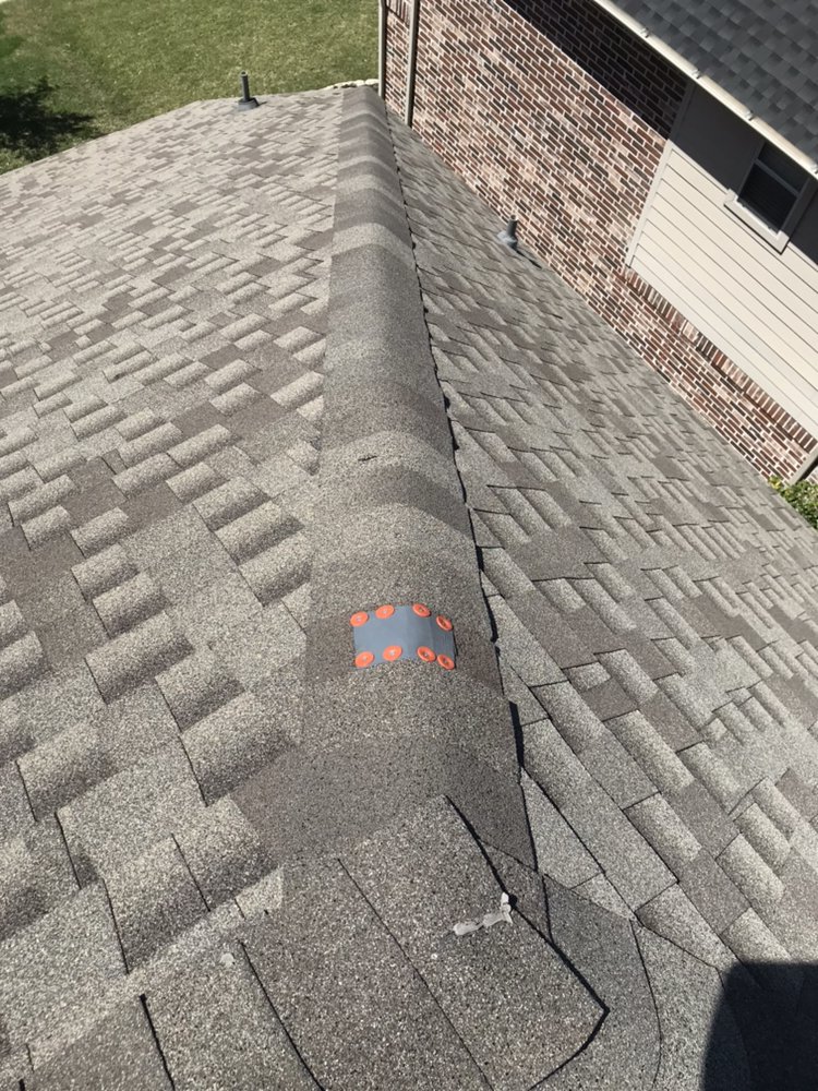 Slide of Texas Hammer Roofing