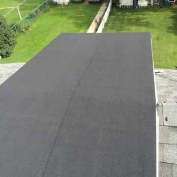 Progo Renovation - a flat roof on a house - Roofing Near Me - Calgary, Alberta Progo Renovation - a flat roof on a house - Roofing Near Me - Calgary, Alberta