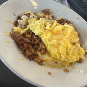 Brick & Spoon - Orlando - Fire Roasted Grits with Bacon and Scrambled Eggs - New American Near Me - Maitland, Florida