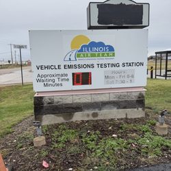 Illinois Air Team - Vehicle Emissions Testing Station - Wait Time on Street Sign