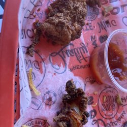 Wild Wing Cafe - Burnt pieces of chicken left uneaten.