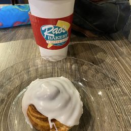 Small cinnamon roll and a tall Carmello latte Small cinnamon roll and a tall Carmello latte