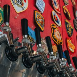 Station 26 Brewing - The tap wall at Station 26 features a rotating selection of award-winning beers and seasonal releases.