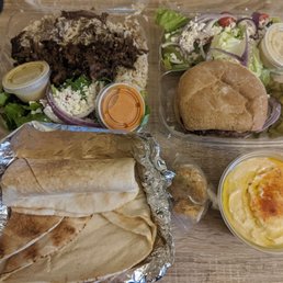 Beef shawarma combo ($13.20), lamb burger with cheese ($12), pita bread ($1.25), baklava (2 pieces $1.50 each), hummus ($5.75) Beef shawarma combo ($13.20), lamb burger with cheese ($12), pita bread ($1.25), baklava (2 pieces $1.50 each), hummus ($5.75)