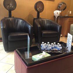 Signature Hair Studio - The chairs fit the dryers are so comfortable. They give complimentary water and coffee. This is also a full spa salon.